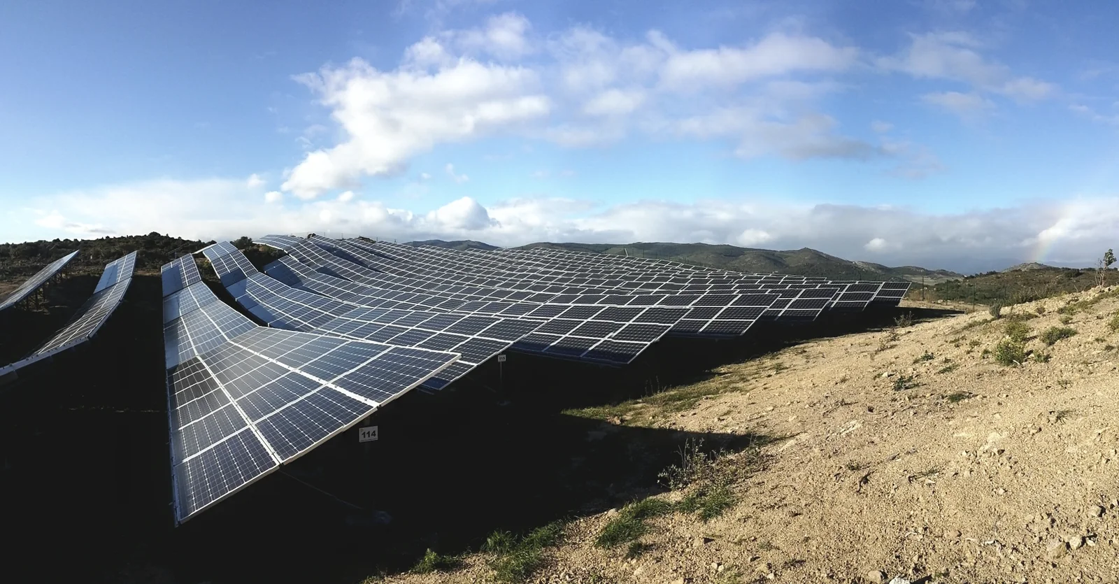 PV plant with self-shading caused by row spacing and terrain