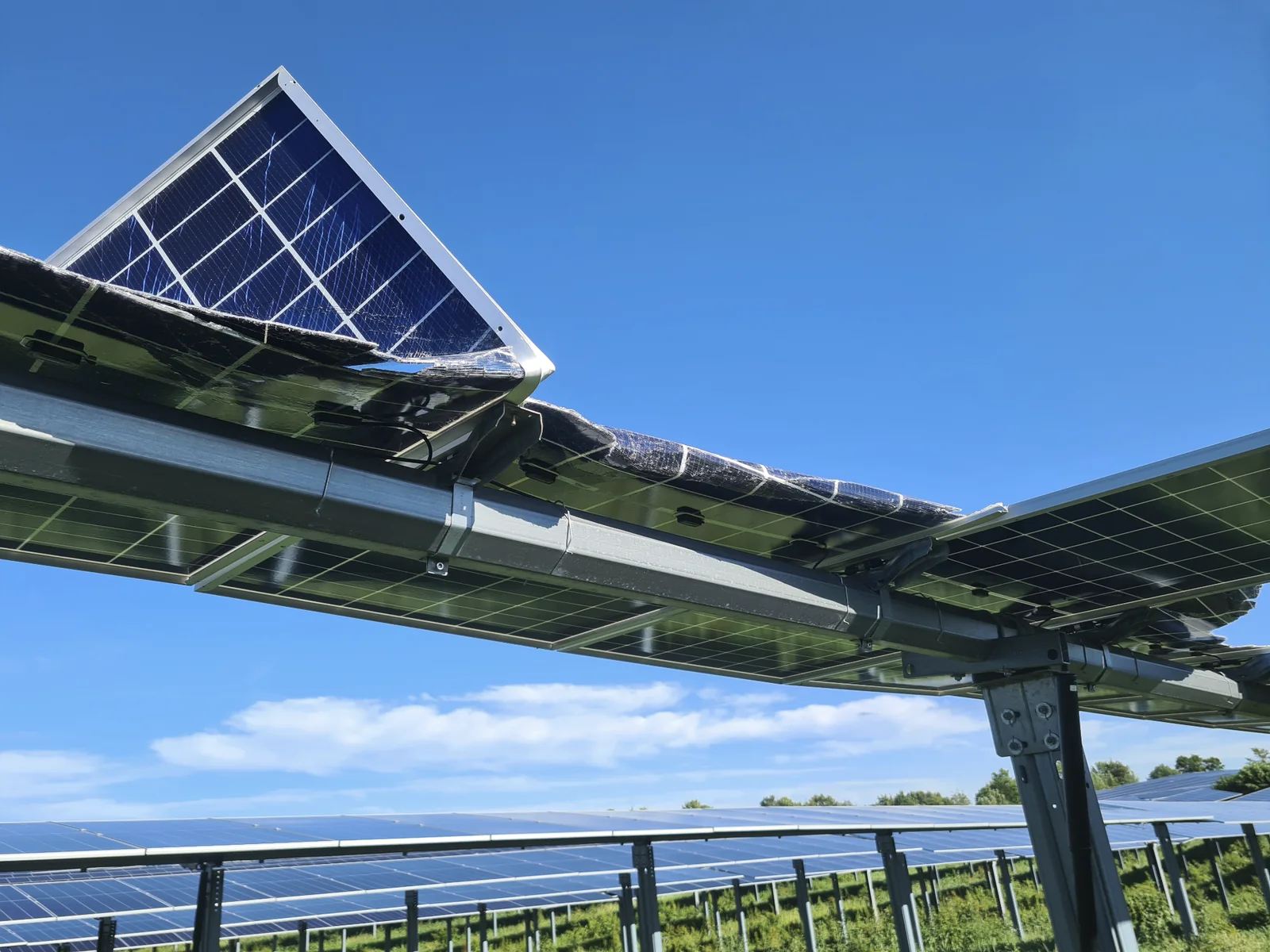 Storm damage with mechanically deformed PV modules and mounting structure